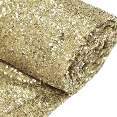 Gold sequin fabric roll, perfect for crafts and decorations.