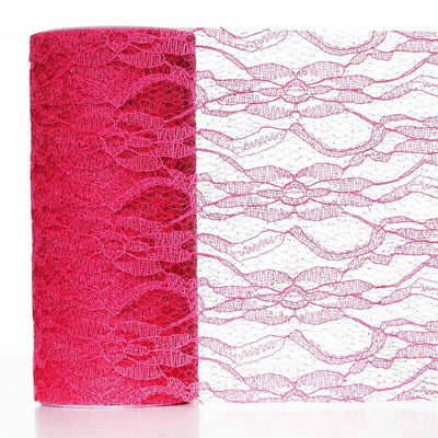 Pink lace fabric roll on a white backdrop