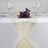 Elegant yellow table runner with purple flowers on a dining table setting. #whtbkgd