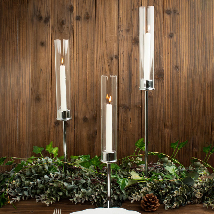 Set Of Silver Metal Taper Candle Holders With Clear Glass Hurricane Shades In 3 Sizes 